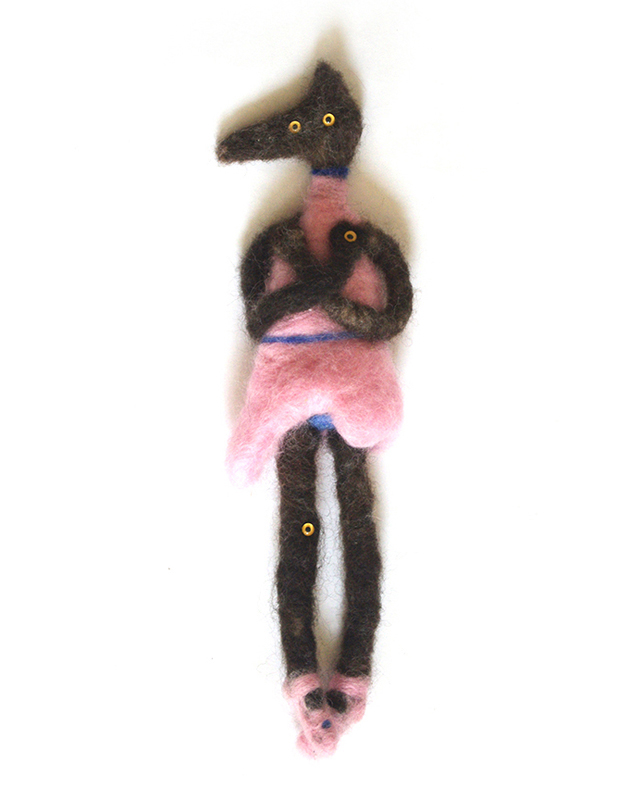 5: "Ballerina Funeral". Needlefelted Wool. 7 x 2. March 2015. Caty Bartholomew. Toy Concept Development & Design. A little ballerina who didn't make it, but she still looks great.