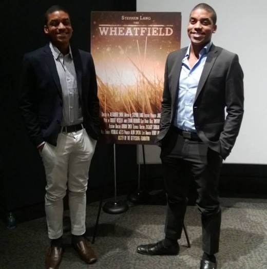 Alexander and Adrian Smith stand by the film’s poster at its premiere.